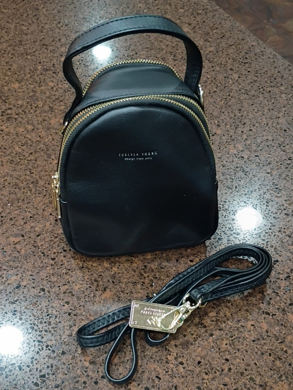 Forever Young Black Mini Backpack Purse with Gold Hardware By Pely